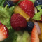 Fruit filled green salad